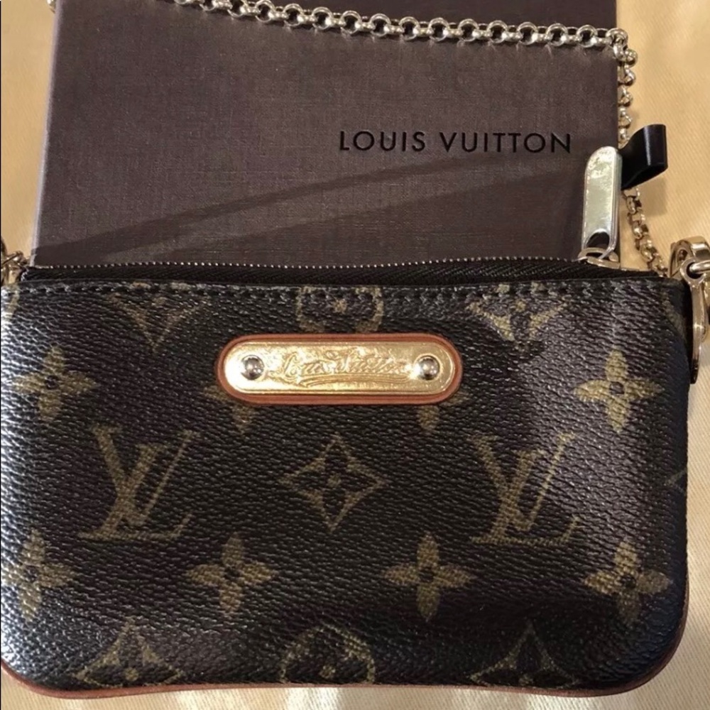 Authentic Louis Vuitton Pochette Mila